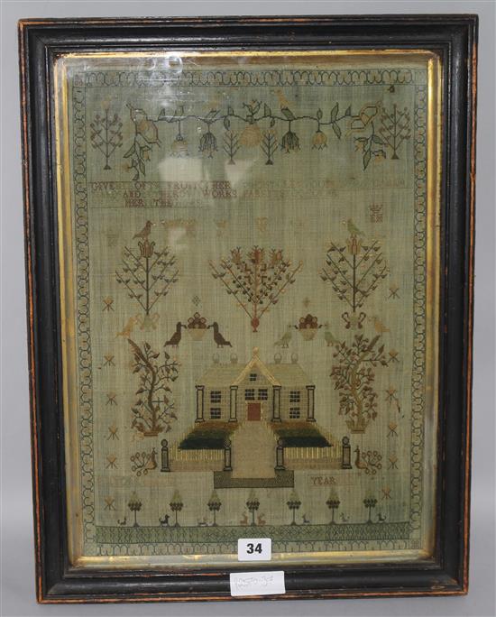 A George III needlework sampler, work with a country house, shrubs and birds, dated 1813